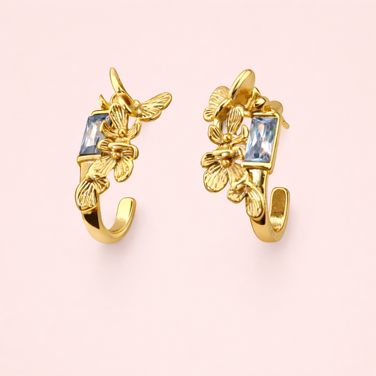 Gold plated crystal stud earrings for women displayed as a single product on clean white background