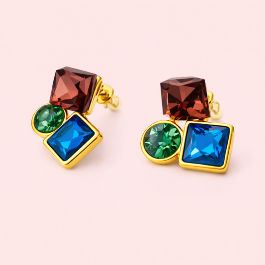 Gold plated geometric multi gemstone stud earrings for women displayed as a single product on soft blush background