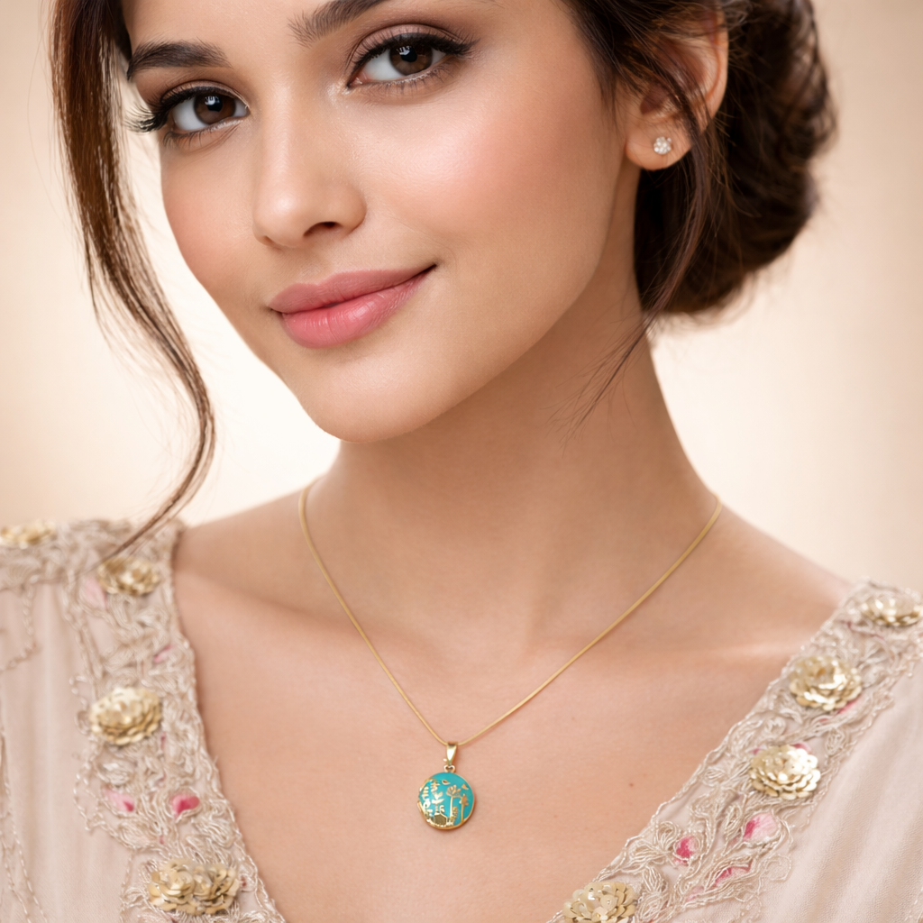 Woman wearing a gold necklace with a blue pendant against a beige background